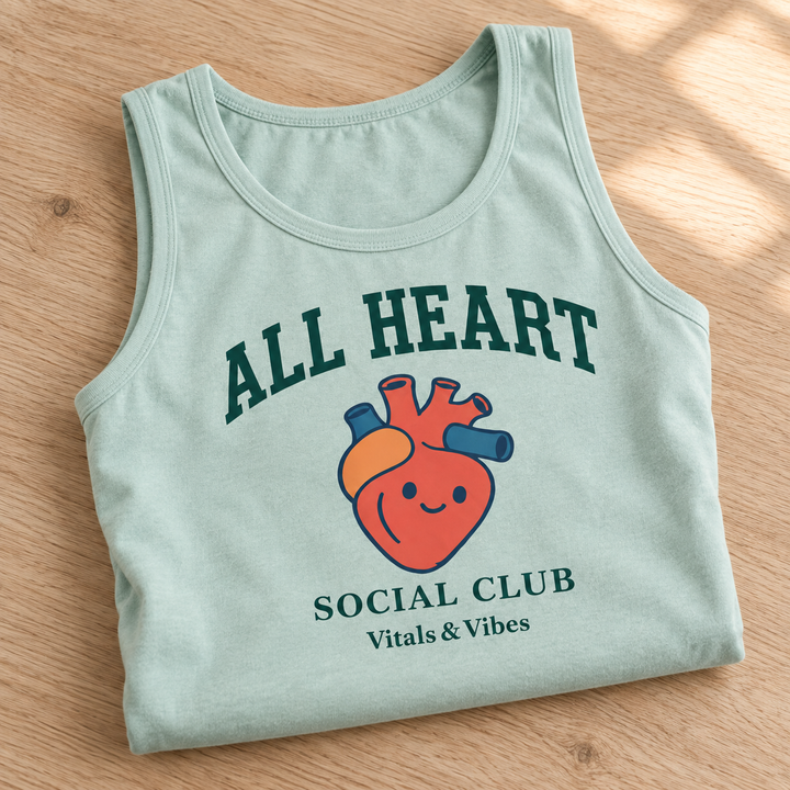 Relaxed unisex tank in Chalky Mint, folded for a close detail view, showing the design and garment details.