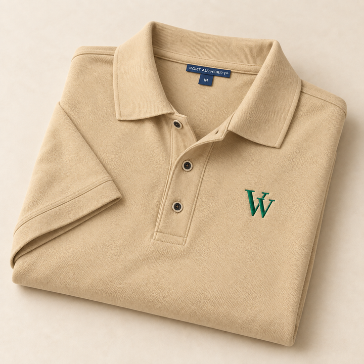 Stone polo folded for a close view of the green VV embroidery, collar and pique fabric.