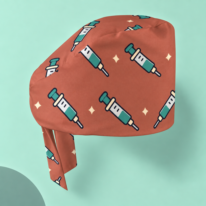 Needle Regular Scrub Cap — Studio view of the printed regular scrub cap on a coordinated background.