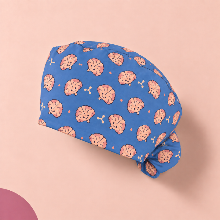 Brain Ponytail Scrub Cap — Studio view of the printed cap on a coordinated background.
