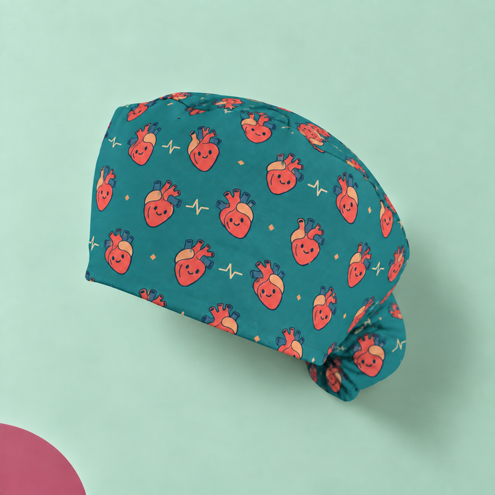 Heart Ponytail Scrub Cap — Studio view of the printed cap on a coordinated background.