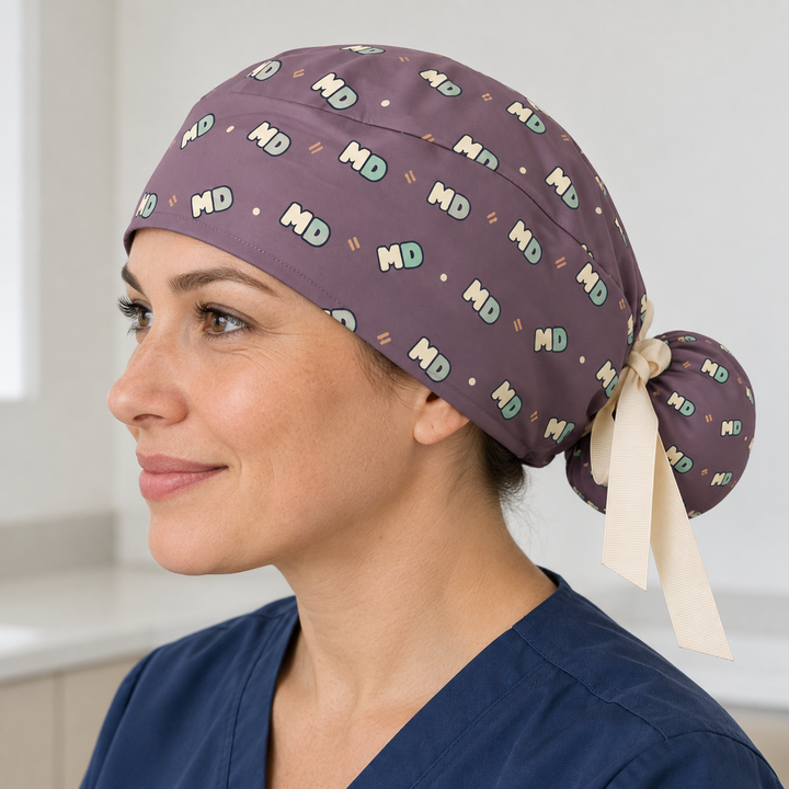 MD ponytail scrub cap worn with plain scrubs in a clinical-setting mockup.