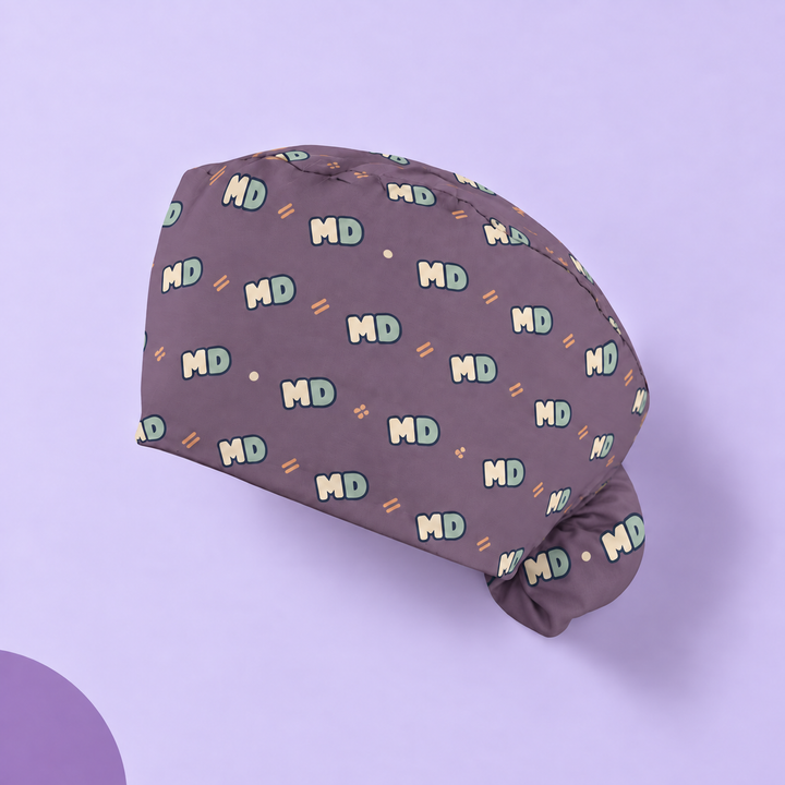 MD Ponytail Scrub Cap — Studio view of the printed cap on a coordinated background.