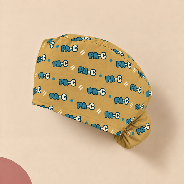 PA-C Ponytail Scrub Cap — Studio view of the printed cap on a coordinated background.