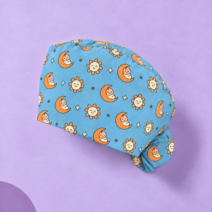 Pediatric Ponytail Scrub Cap — Studio view of the printed cap on a coordinated background.