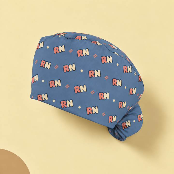RN Ponytail Scrub Cap — Studio view of the printed cap on a coordinated background.