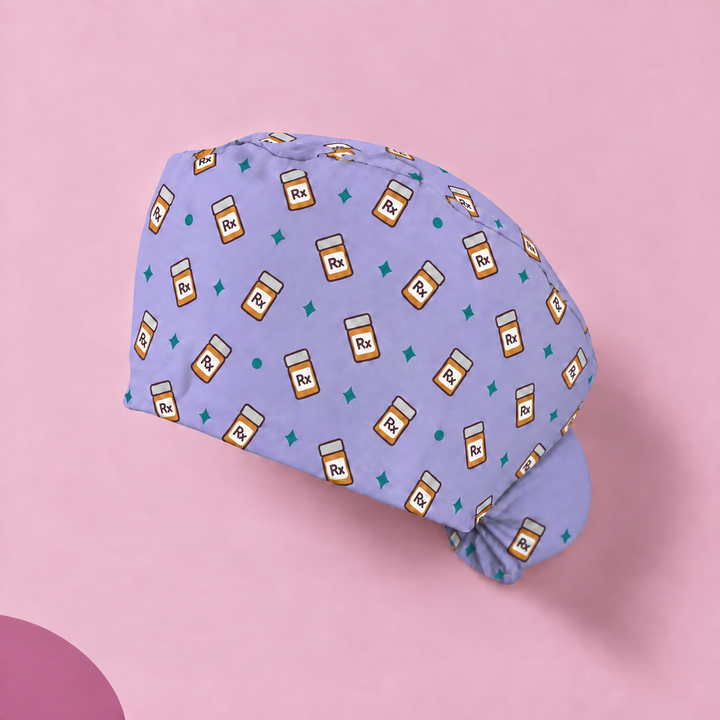 Rx Ponytail Scrub Cap — Studio view of the printed cap on a coordinated background.
