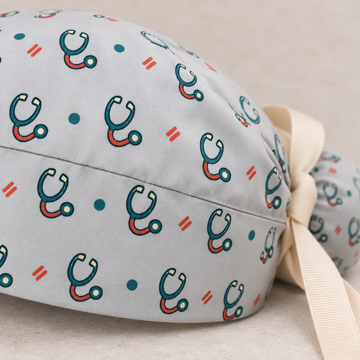 Stethoscope ponytail scrub cap — close-up mockup showing the printed fabric and stitched seam.