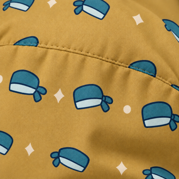 Surgical Cap ponytail scrub cap — close-up mockup showing the printed fabric and stitched seam.