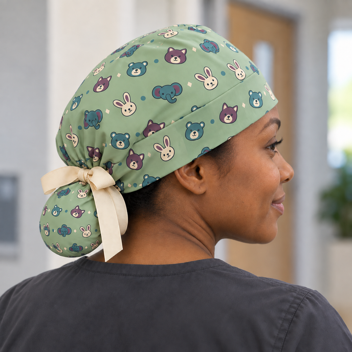 Veterinary ponytail scrub cap worn with plain scrubs in a clinical-setting mockup.